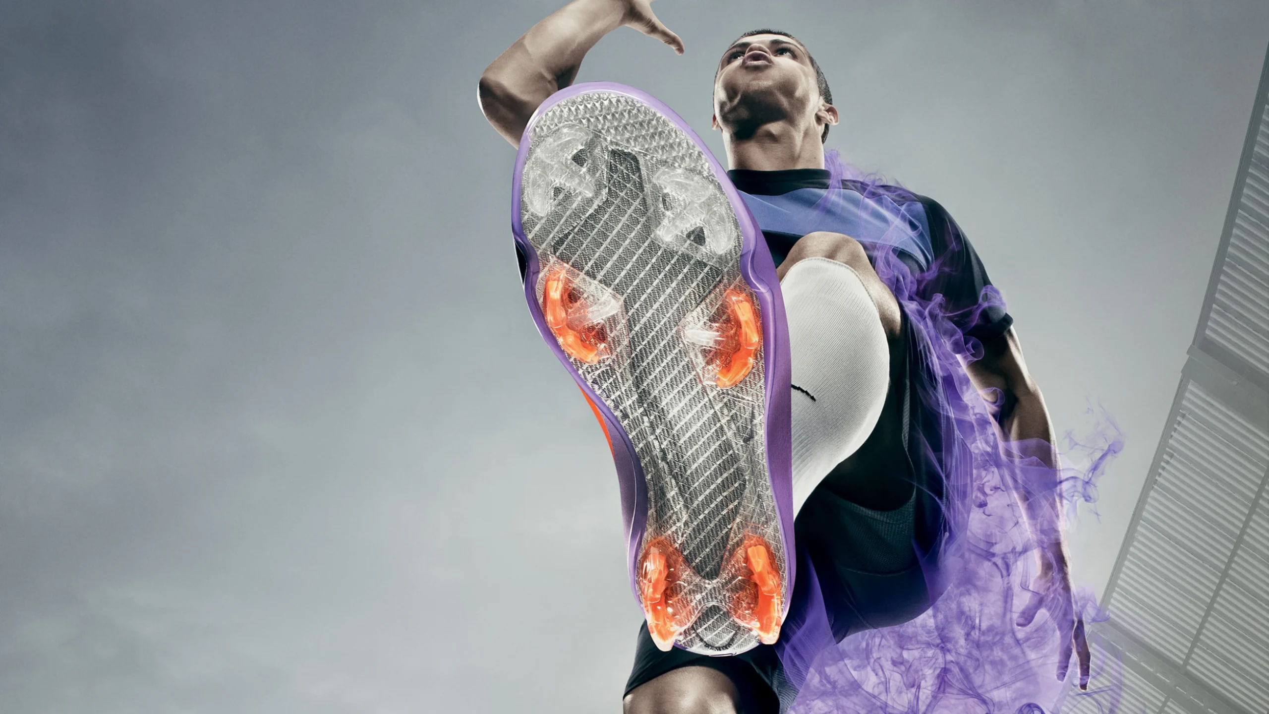 Nike Mercurial Vapor Superfly II sole in low-angle kick with purple smoke